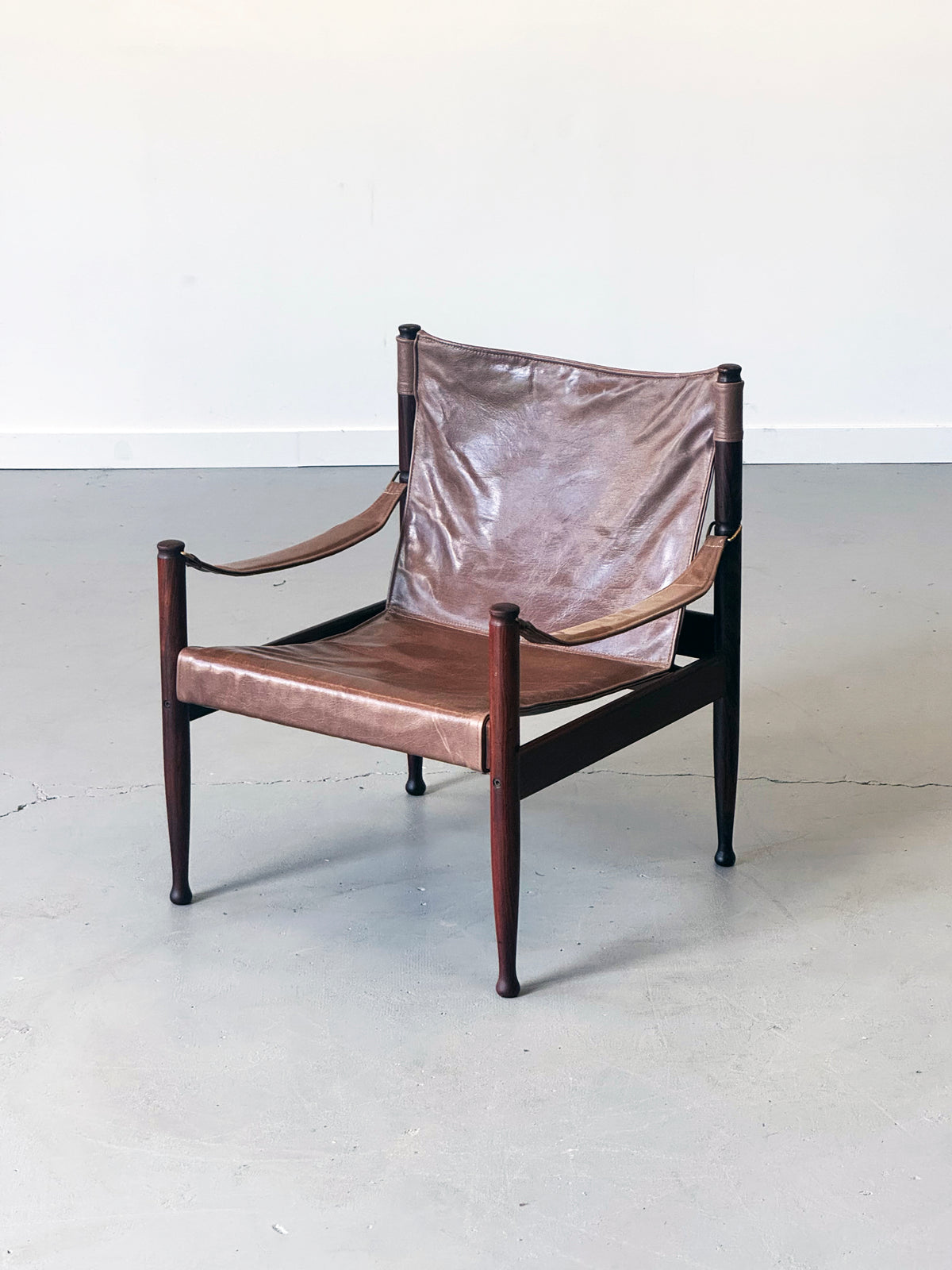 1960s Erik Wørts Safari Chair in Rosewood and Leather for Niels Eilersen, Denmark.