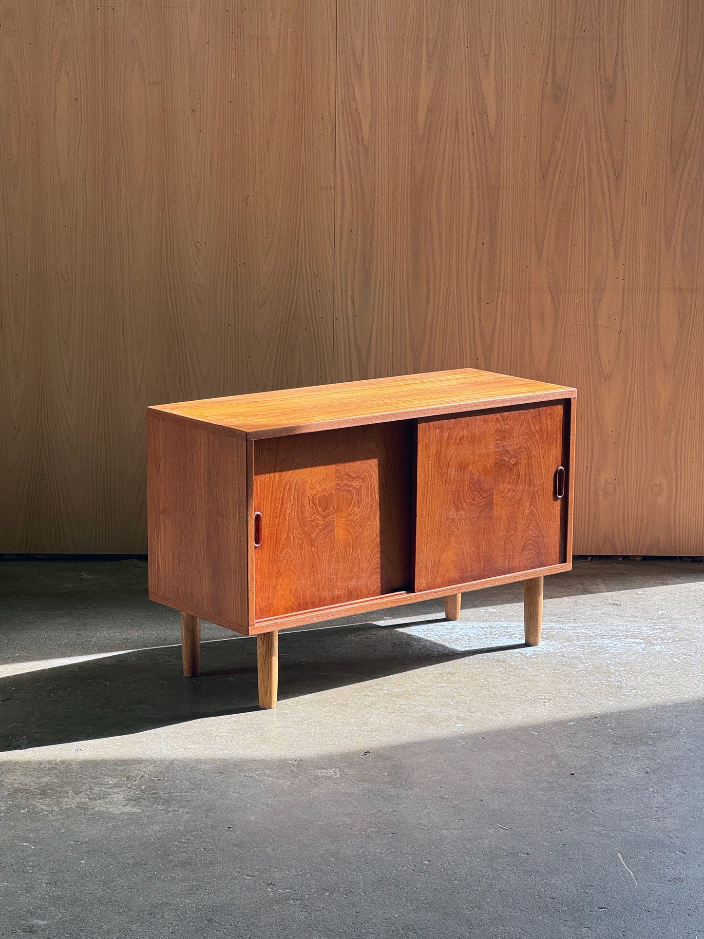 1960s Danish small-scale credenza in teak and oak legs