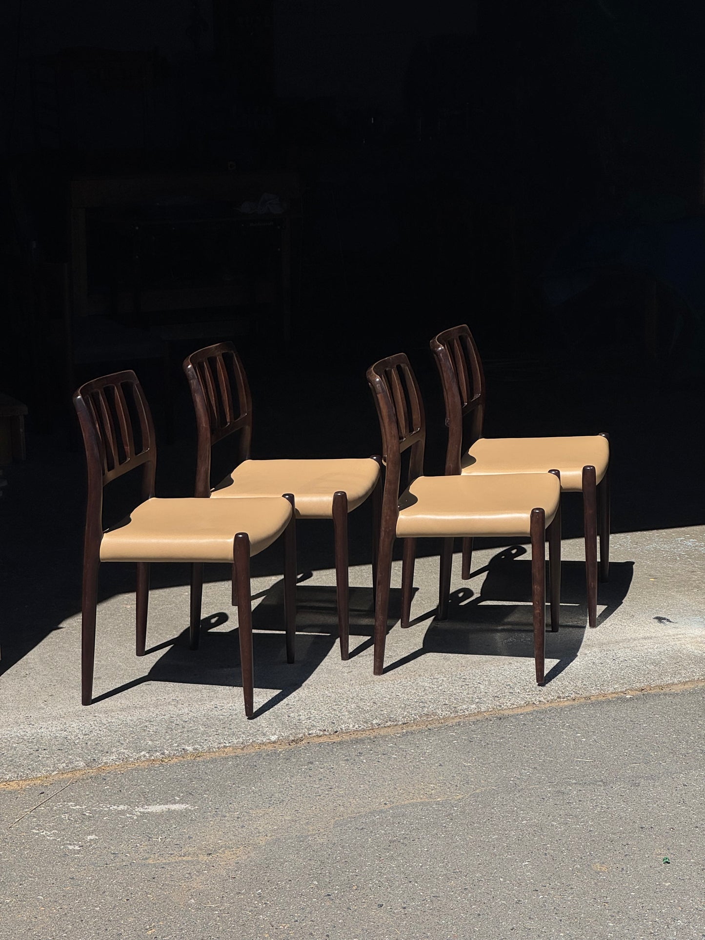 1970s Model 83 Dining Chairs by Niels Otto Møller for J.L. Møllers Møbelfabrik in solid wood and leather