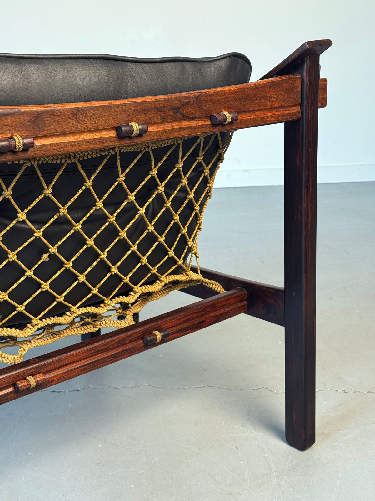 1960s Pair of Amazonas Lounge Chairs by Jean Gillon for Wood Art in Rosewood and Black Leather.