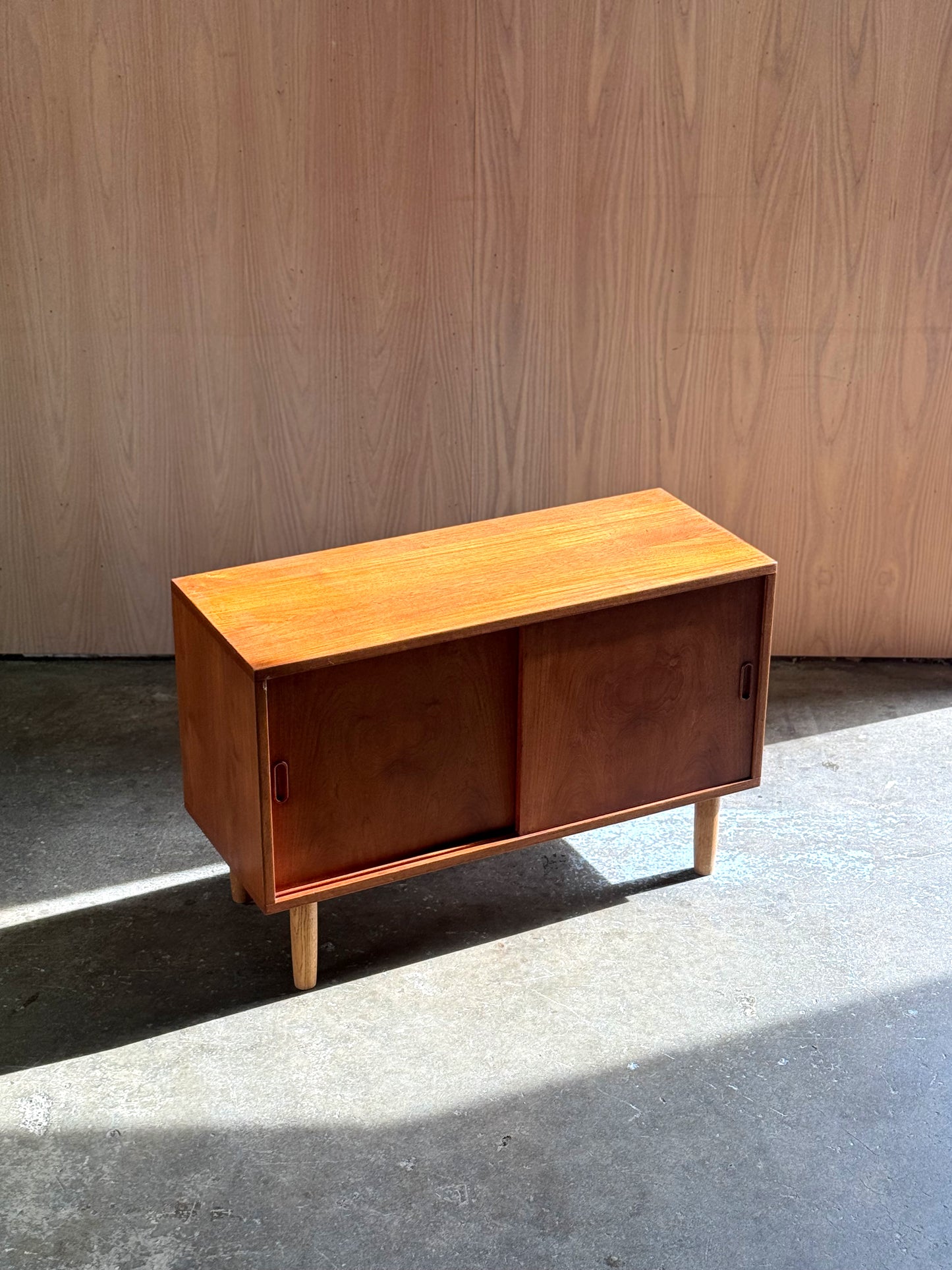 1960s Danish small-scale credenza in teak and oak legs