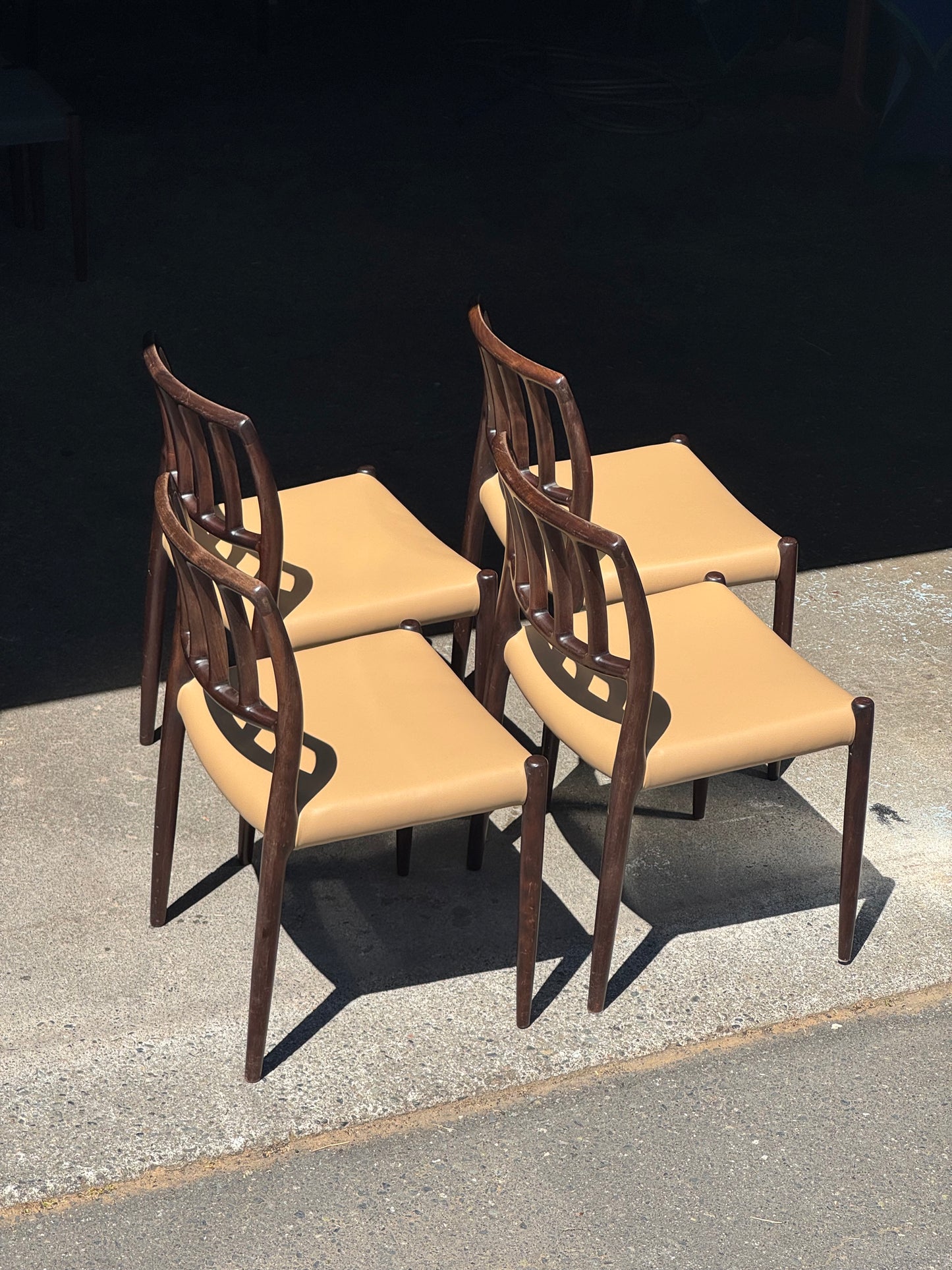 1970s Model 83 Dining Chairs by Niels Otto Møller for J.L. Møllers Møbelfabrik in solid wood and leather