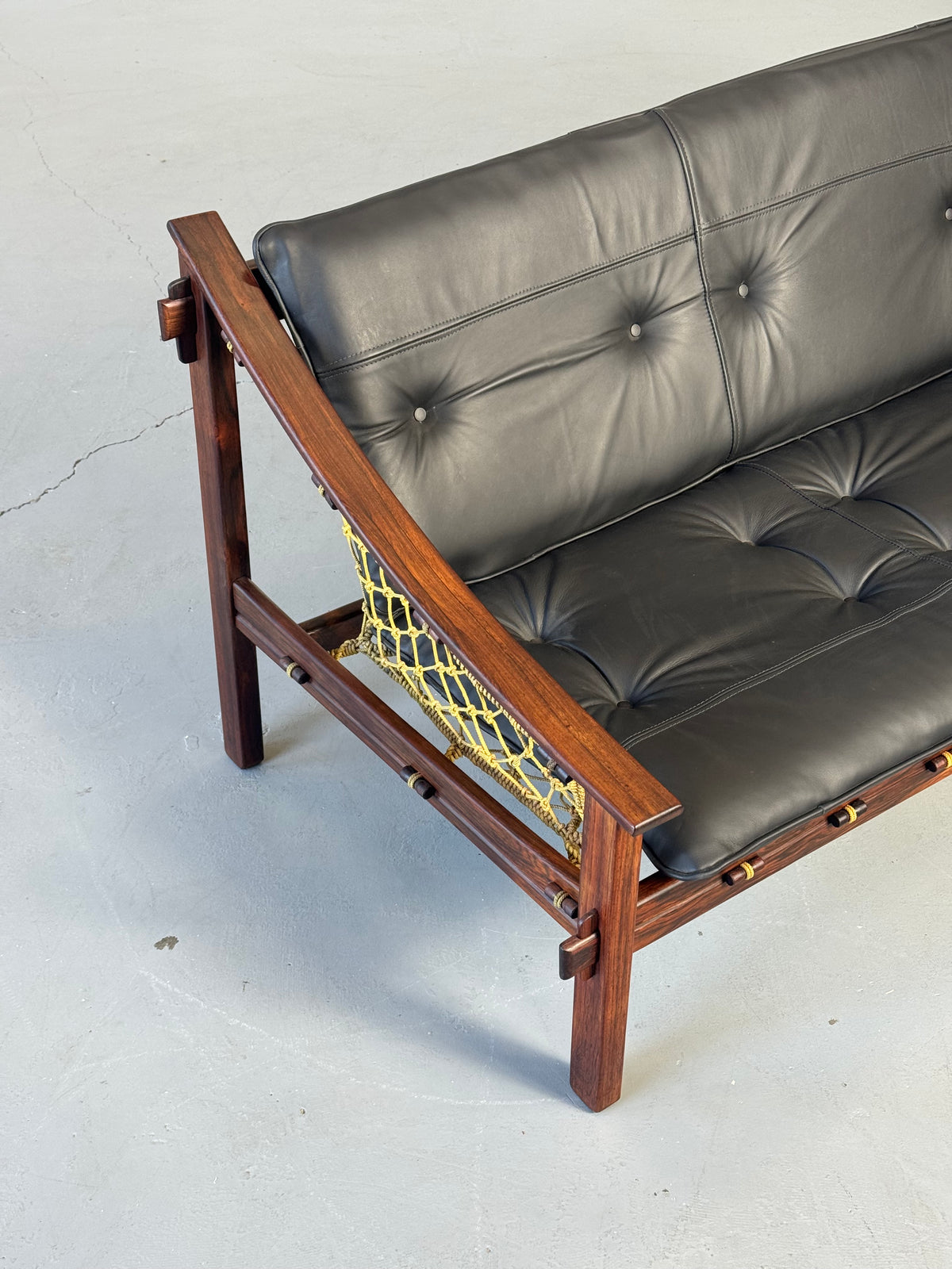1960s Amazonas Sofa by Jean Gillon for Wood Art in rosewood and black leather