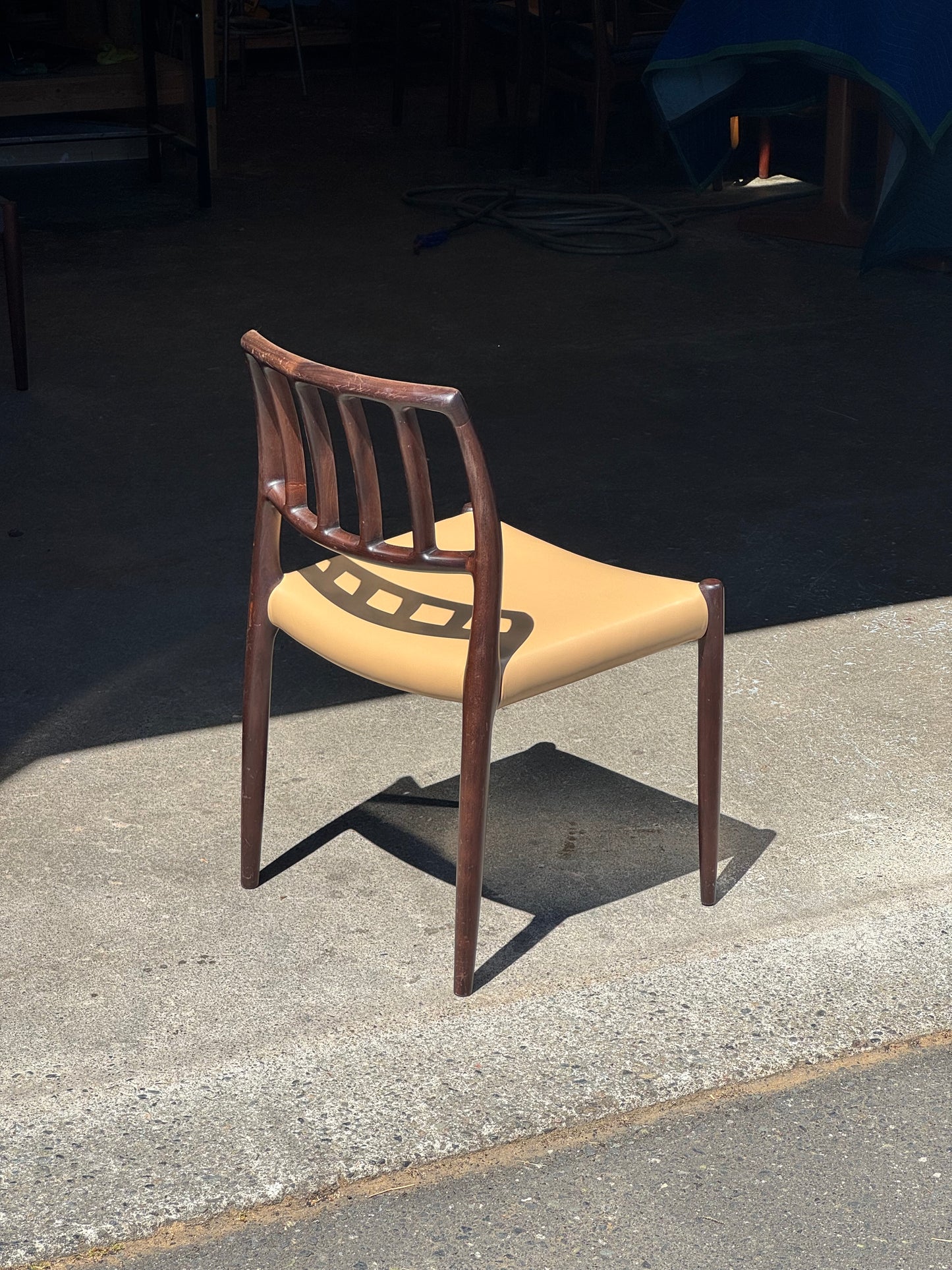 1970s Model 83 Dining Chairs by Niels Otto Møller for J.L. Møllers Møbelfabrik in solid wood and leather