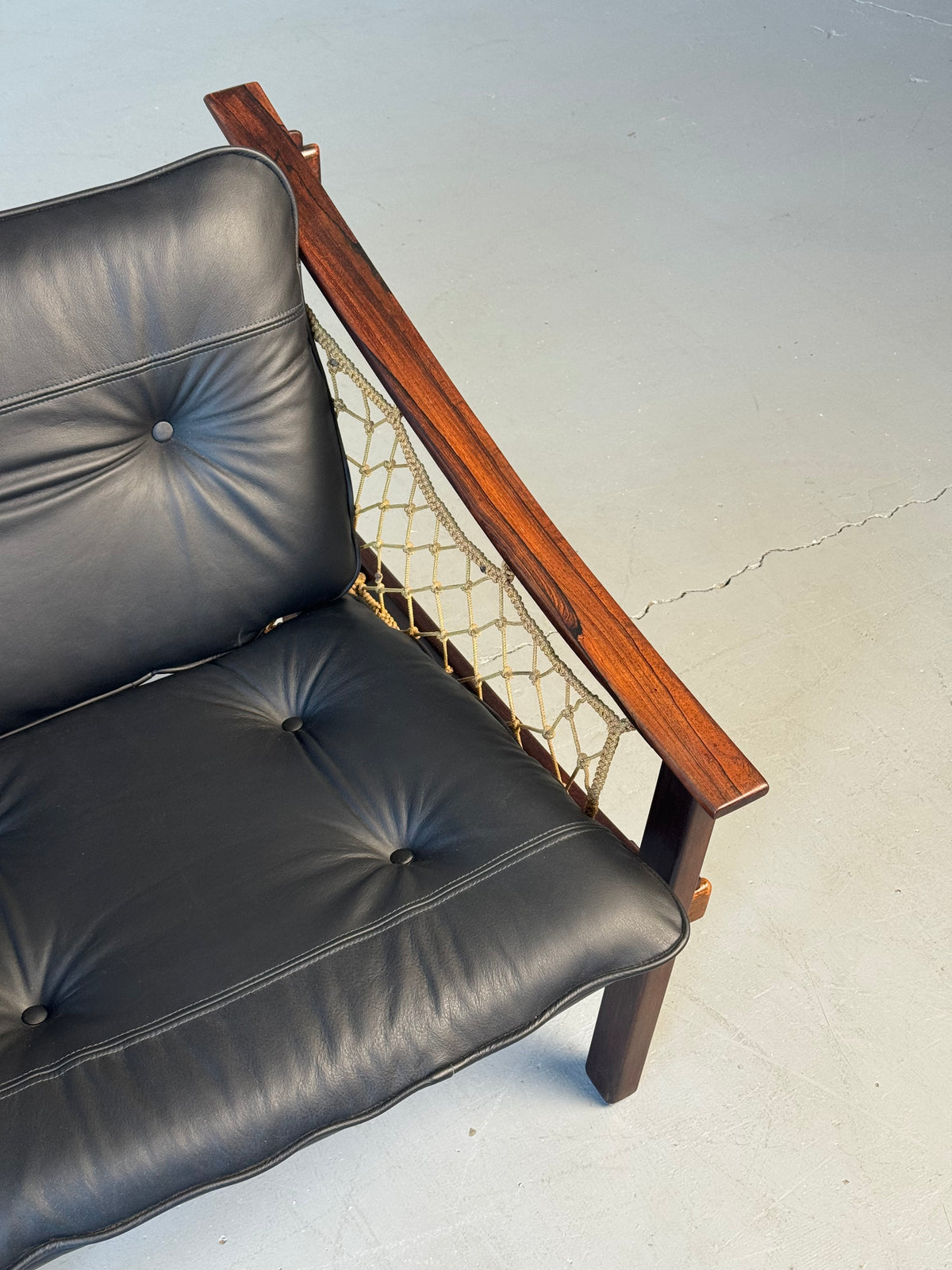 1960s Pair of Amazonas Lounge Chairs by Jean Gillon for Wood Art in Rosewood and Black Leather.