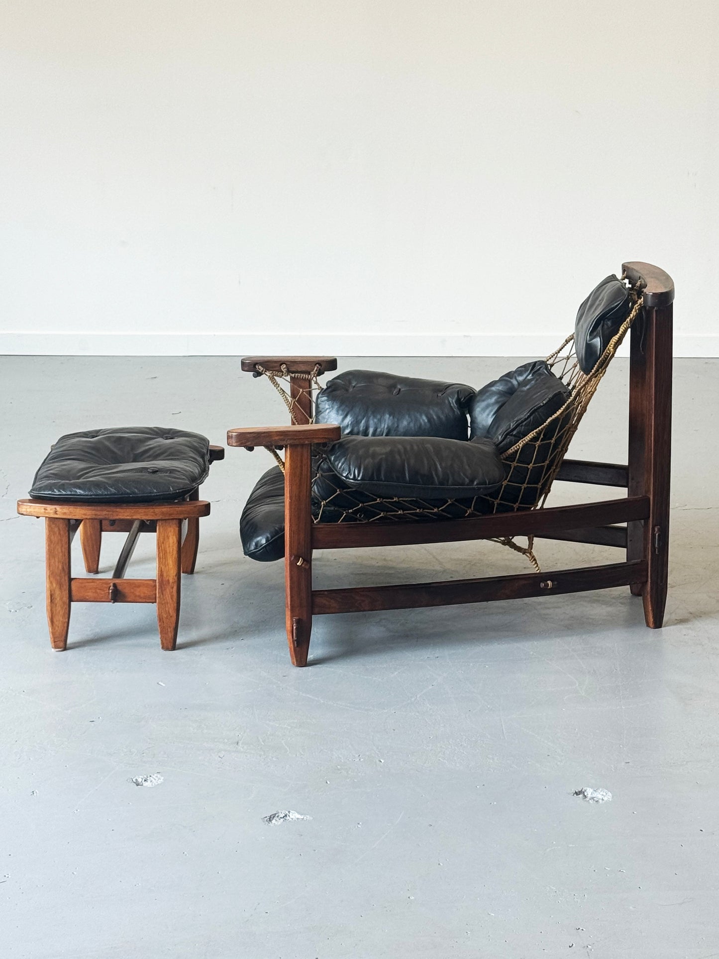 1960s Jangada Lounge Chair and Ottoman by Jean Gillon in rosewood and black leather