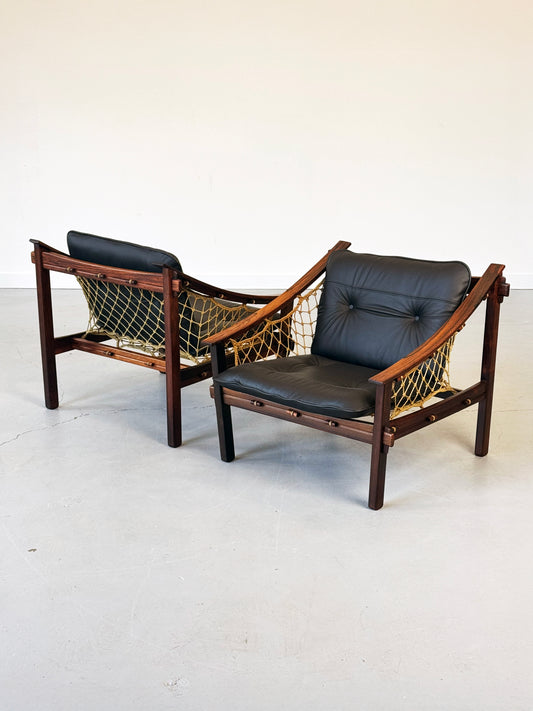 1960s Pair of Amazonas Lounge Chairs by Jean Gillon for Wood Art in Rosewood and Black Leather.