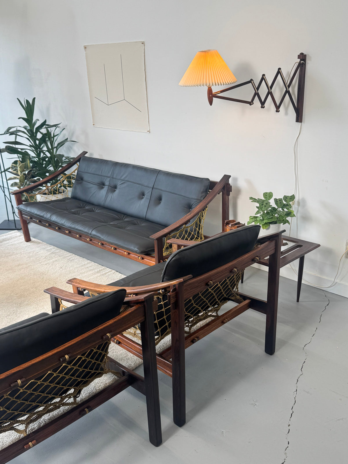 1960s Pair of Amazonas Lounge Chairs by Jean Gillon for Wood Art in Rosewood and Black Leather.