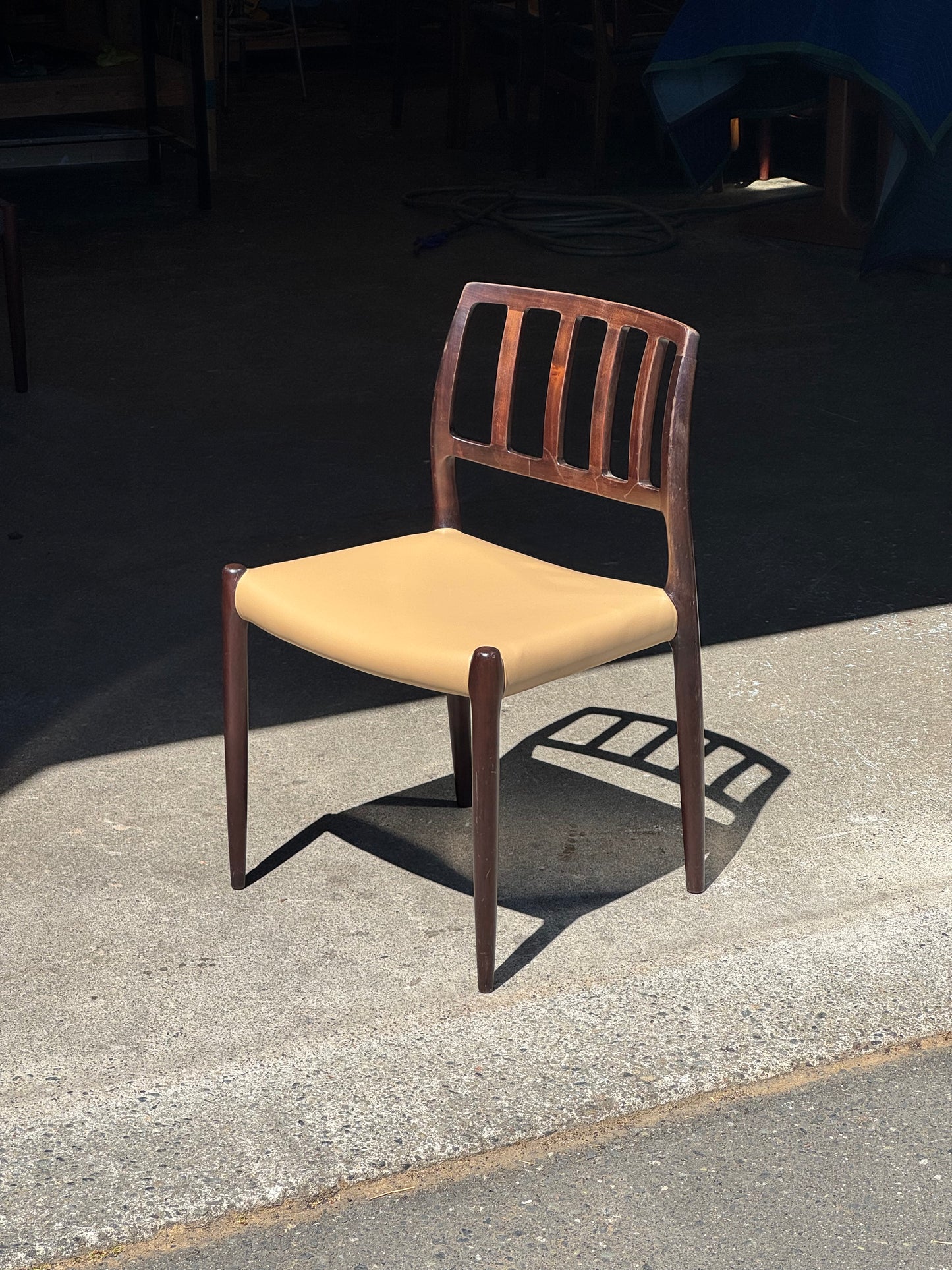 1970s Model 83 Dining Chairs by Niels Otto Møller for J.L. Møllers Møbelfabrik in solid wood and leather