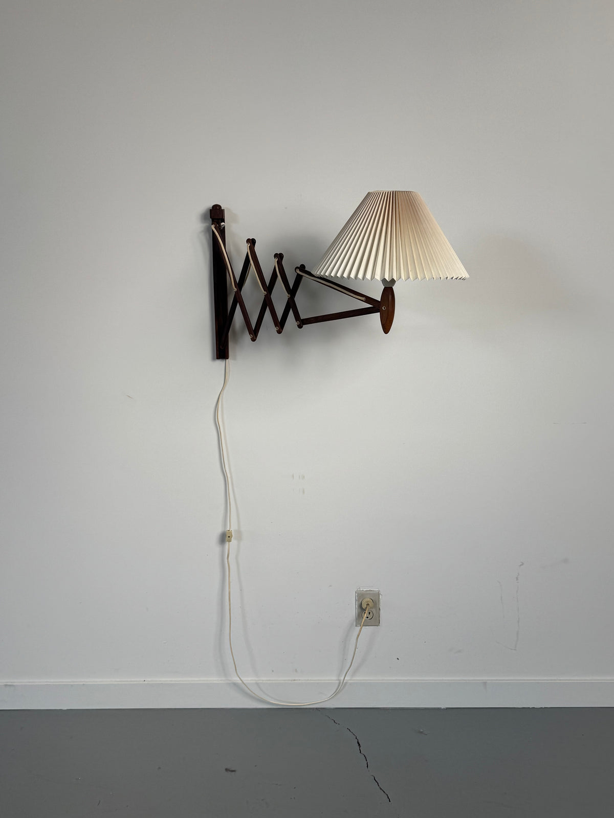 1960s Wall Lamp Model 332 334 by Le Klint in rosewood and pleated shade.