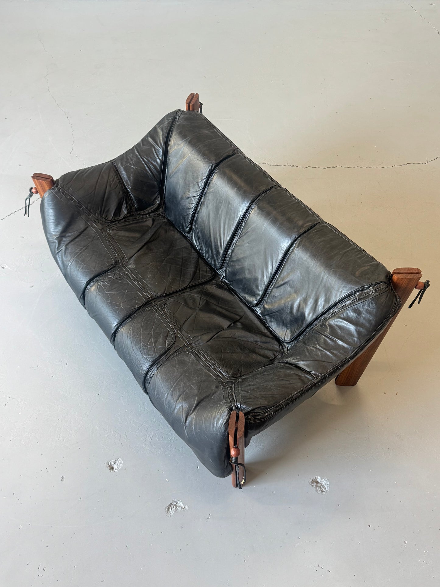 1970s MP-211 Two-Seater Sofa by Percival Lafer in jatobá and original black leather.