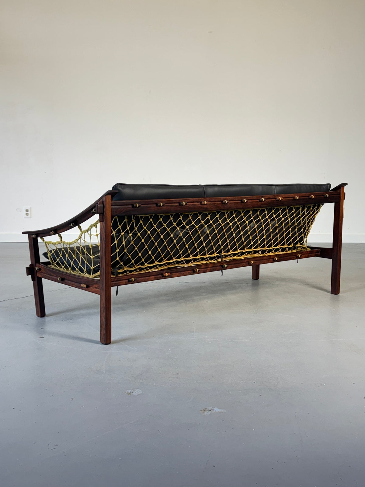 1960s Amazonas Sofa by Jean Gillon for Wood Art in rosewood and black leather