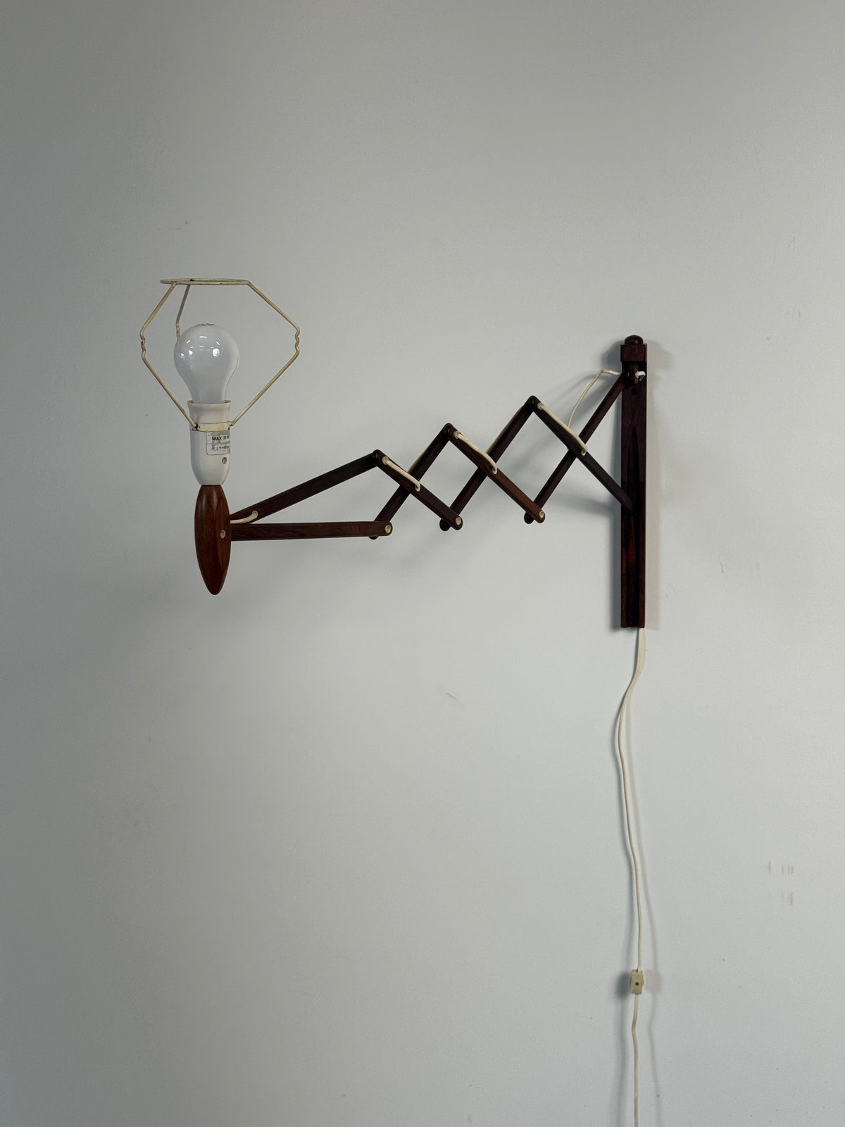 1960s Wall Lamp Model 332 334 by Le Klint in rosewood and pleated shade.
