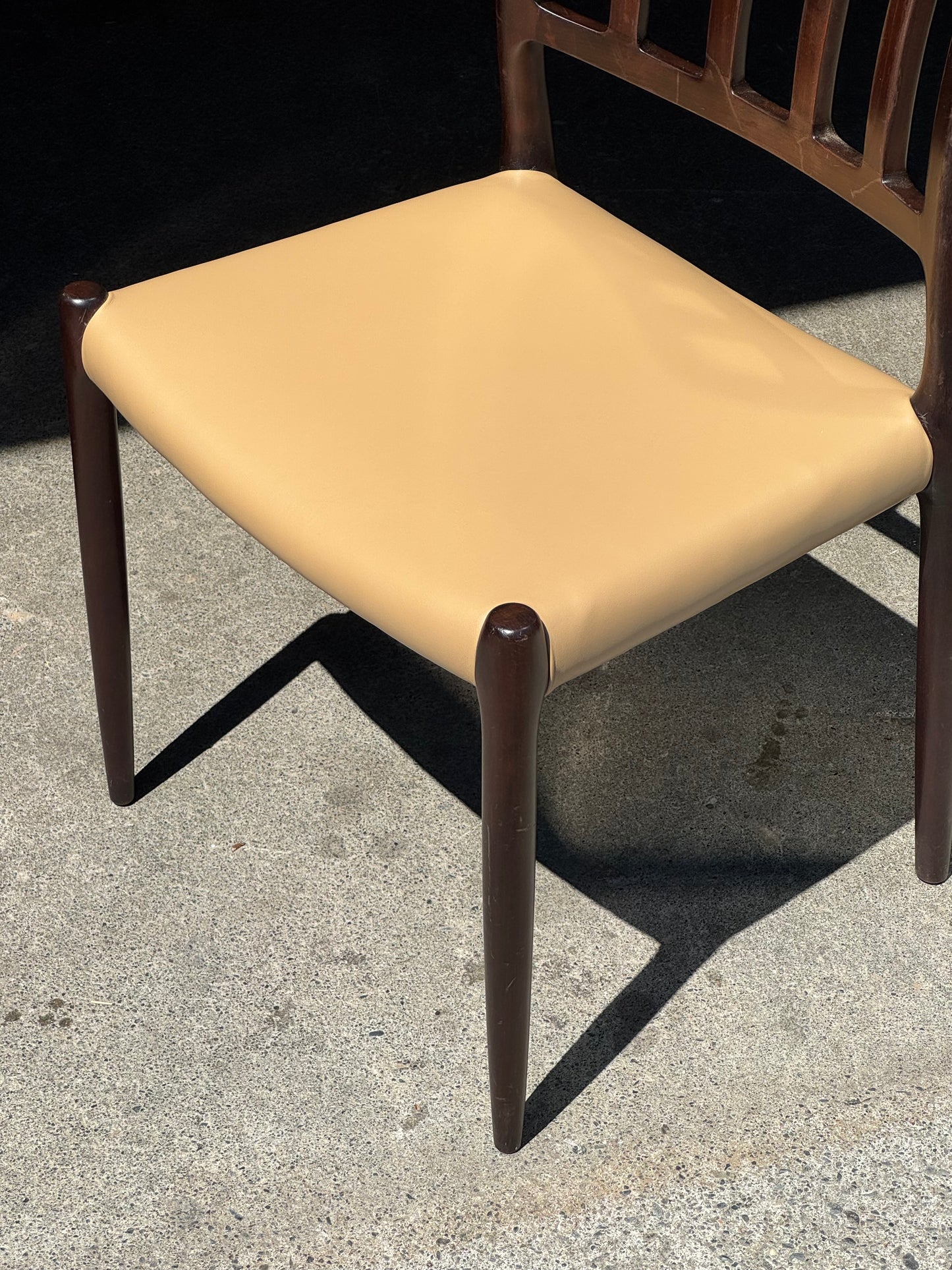 1970s Model 83 Dining Chairs by Niels Otto Møller for J.L. Møllers Møbelfabrik in solid wood and leather