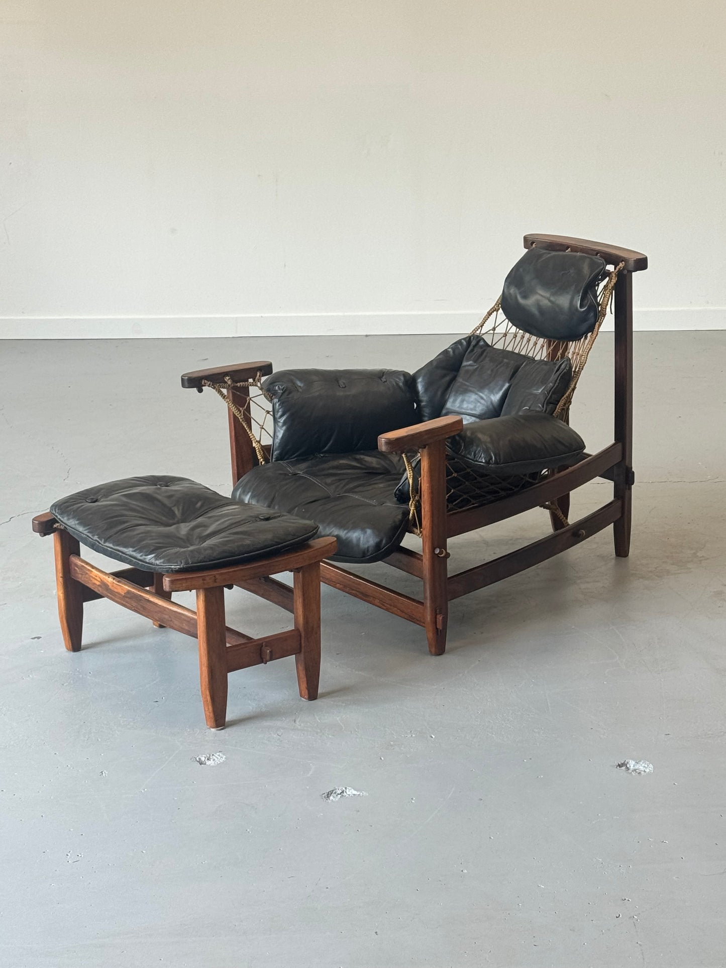 1960s Jangada Lounge Chair and Ottoman by Jean Gillon in rosewood and black leather