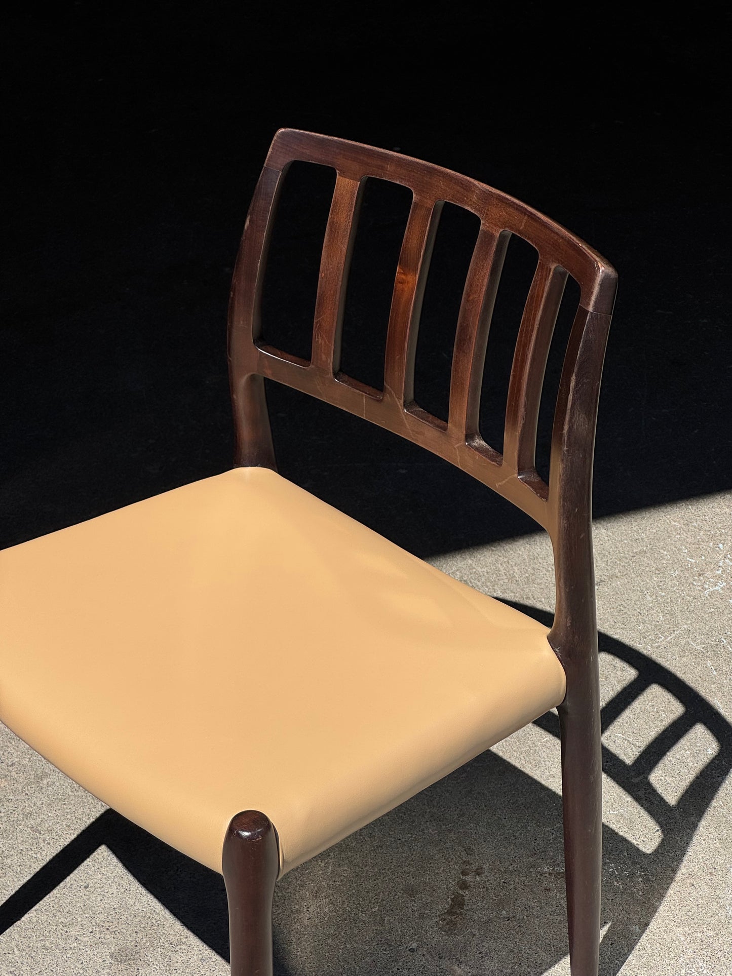 1970s Model 83 Dining Chairs by Niels Otto Møller for J.L. Møllers Møbelfabrik in solid wood and leather
