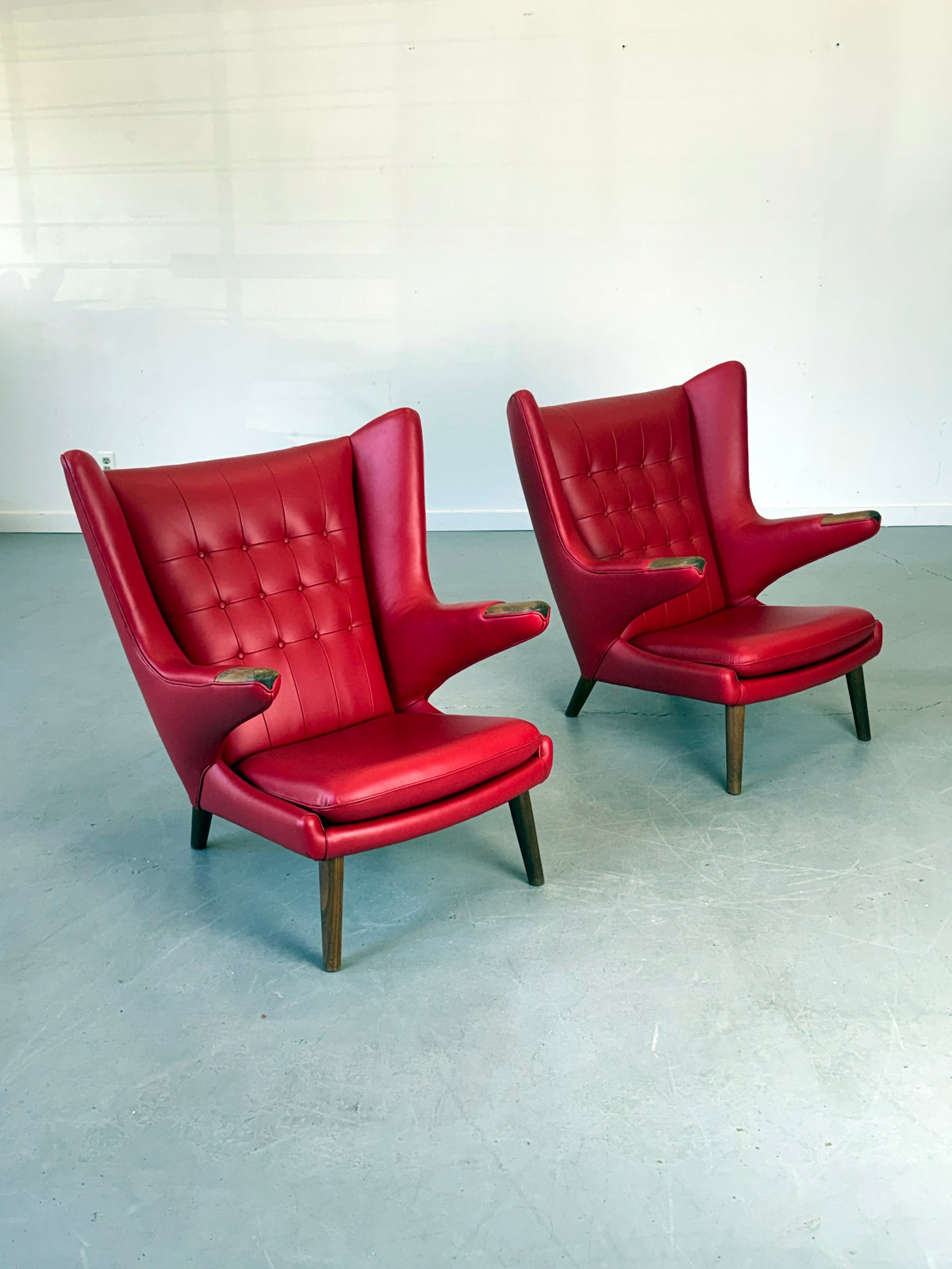 Pair of 1950s AP19 Papa Bear Lounge Chairs by Hans J. Wegner for A.P. Stolen in Red Leather, Denmark.