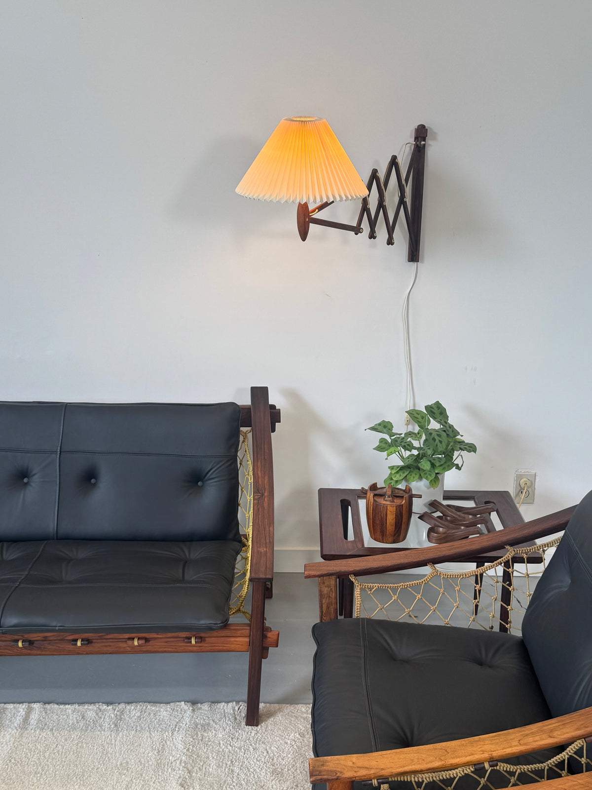 1960s Pair of Amazonas Lounge Chairs by Jean Gillon for Wood Art in Rosewood and Black Leather.