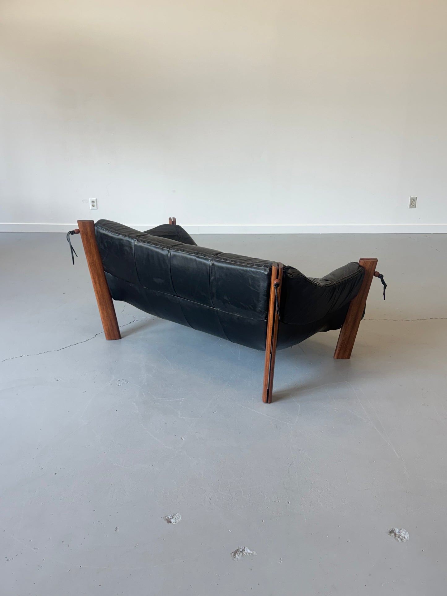 1970s MP-211 Two-Seater Sofa by Percival Lafer in jatobá and original black leather.