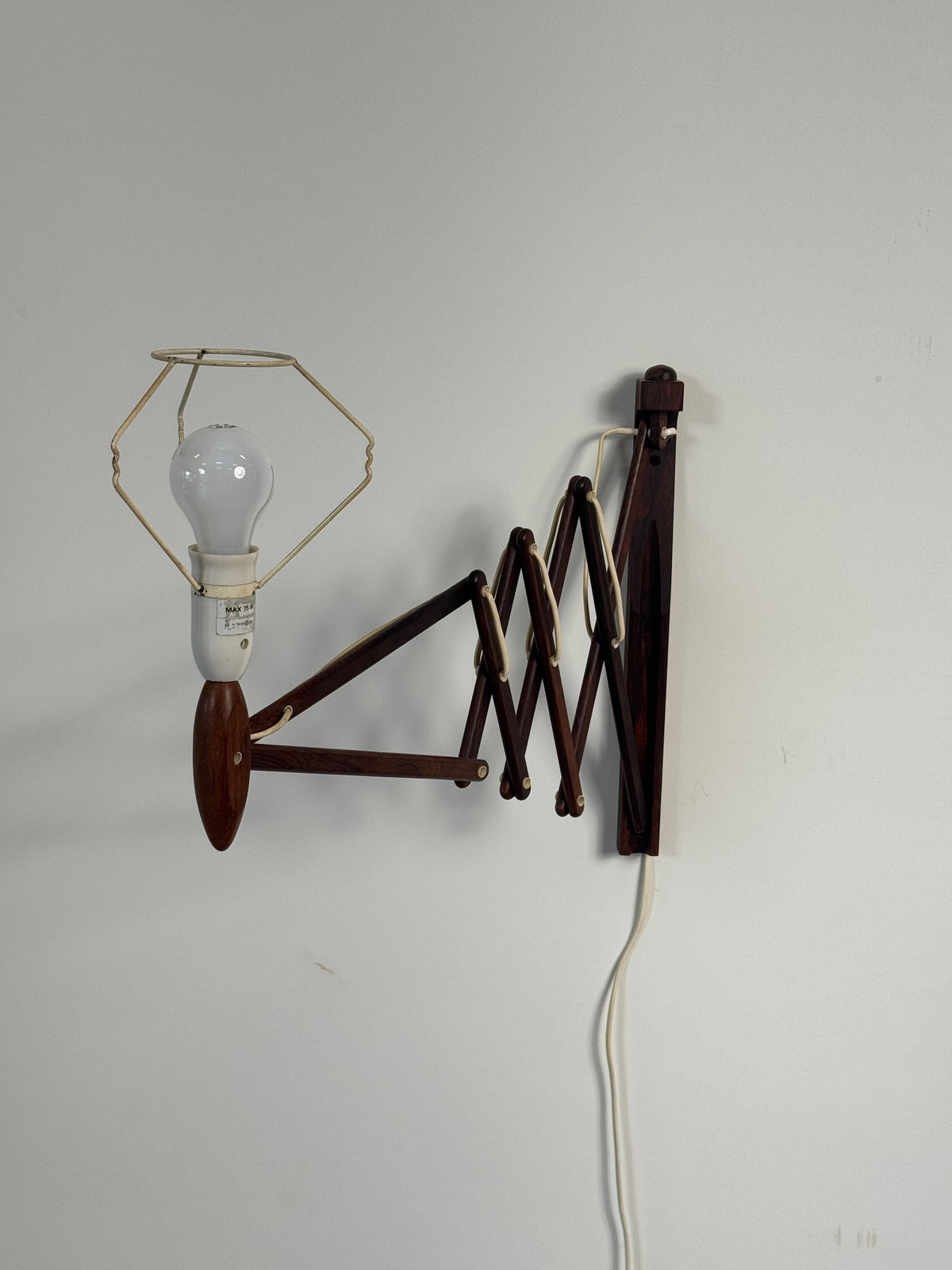1960s Wall Lamp Model 332 334 by Le Klint in rosewood and pleated shade.