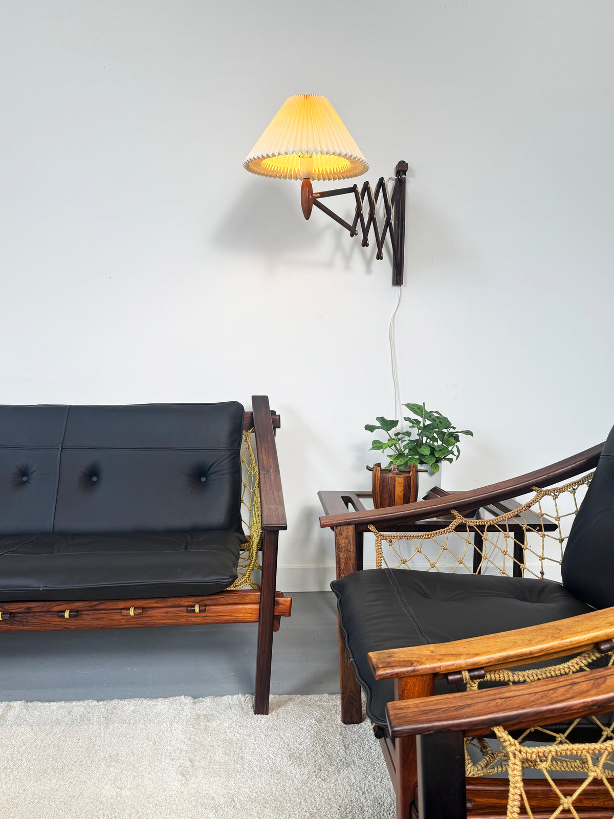 1960s Wall Lamp Model 332 334 by Le Klint in rosewood and pleated shade.