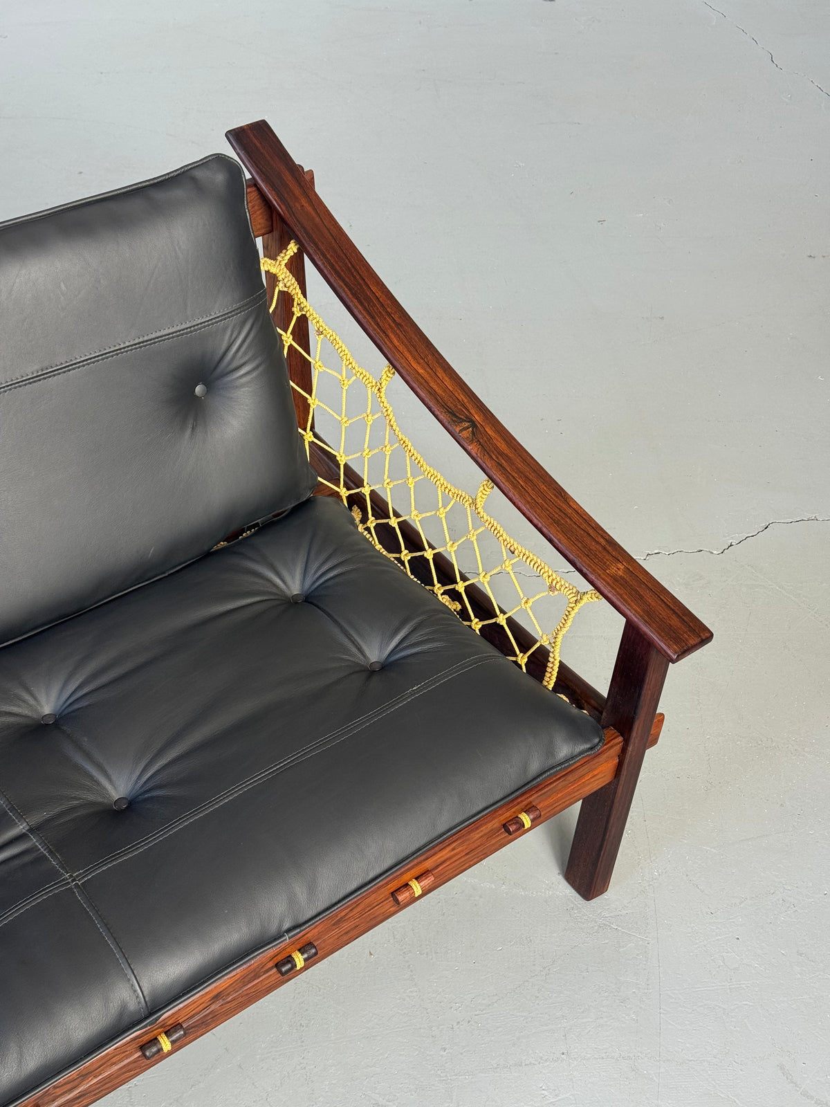 1960s Amazonas Sofa by Jean Gillon for Wood Art in rosewood and black leather