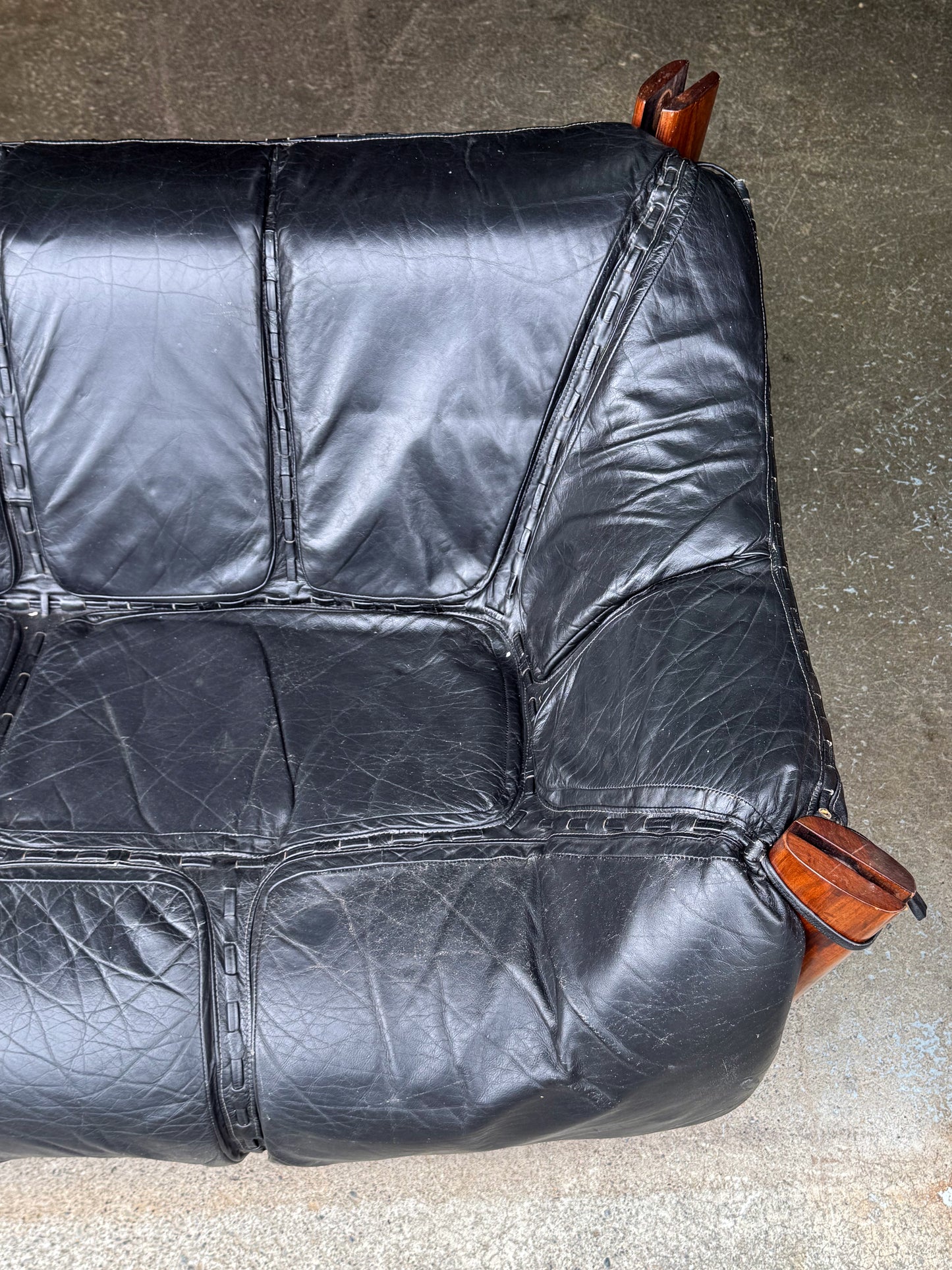 1970s MP-211 Two-Seater Sofa by Percival Lafer in original black leather and rosewood