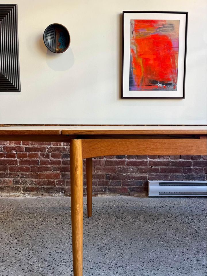 1950s Danish teak and oak draw-leaf dining table by Børge Mogensen