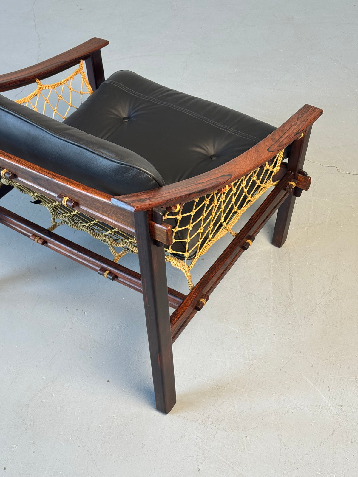 1960s Pair of Amazonas Lounge Chairs by Jean Gillon for Wood Art in Rosewood and Black Leather.