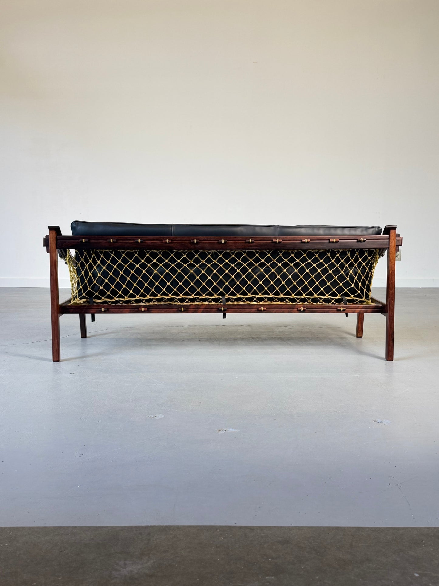 1960s Amazonas Sofa by Jean Gillon for Wood Art in rosewood and black leather