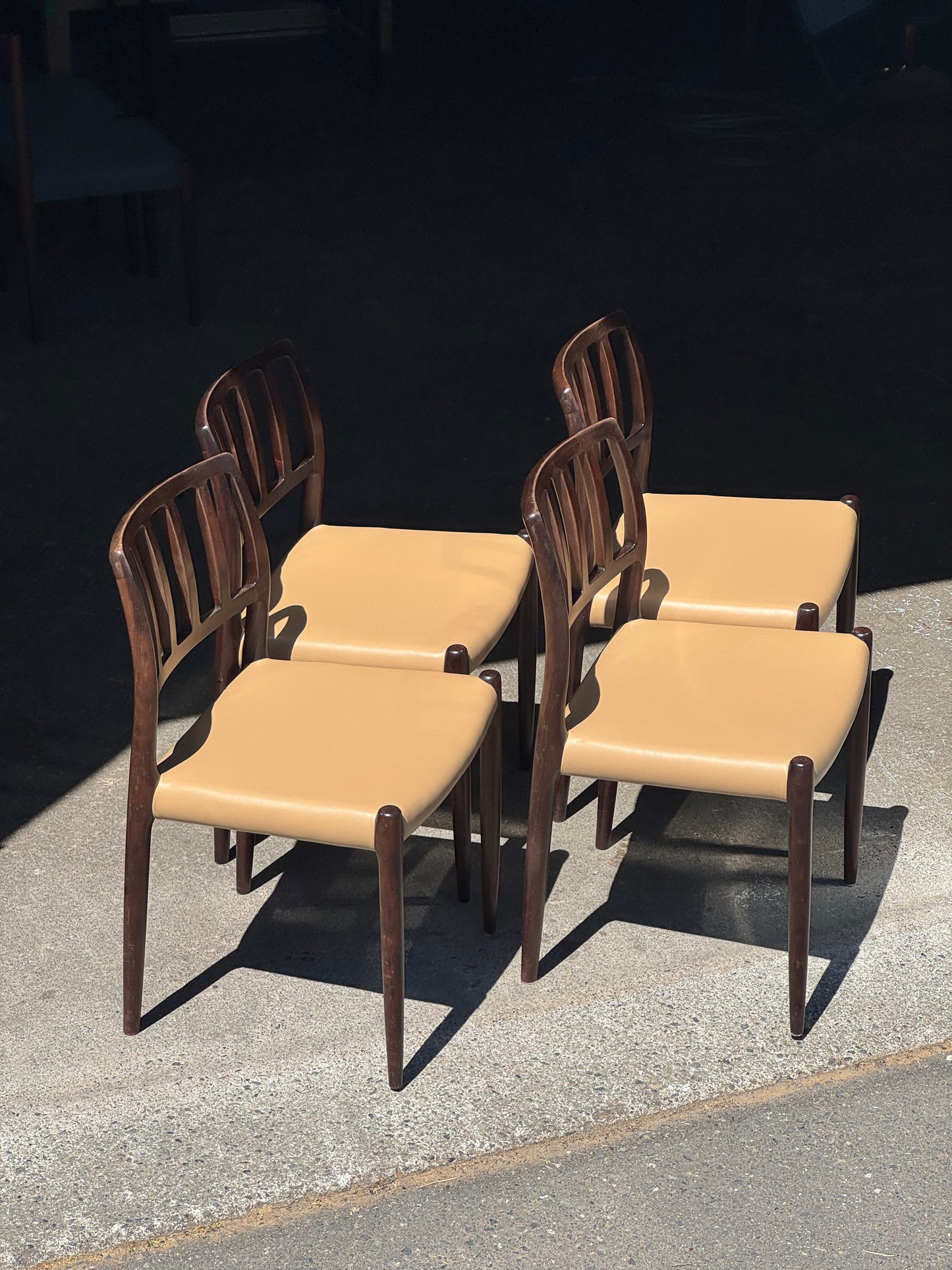 1970s Model 83 Dining Chairs by Niels Otto Møller for J.L. Møllers Møbelfabrik in solid wood and leather