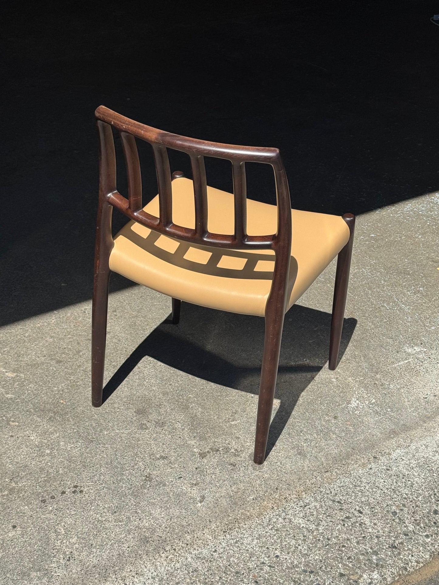 1970s Model 83 Dining Chairs by Niels Otto Møller for J.L. Møllers Møbelfabrik in solid wood and leather