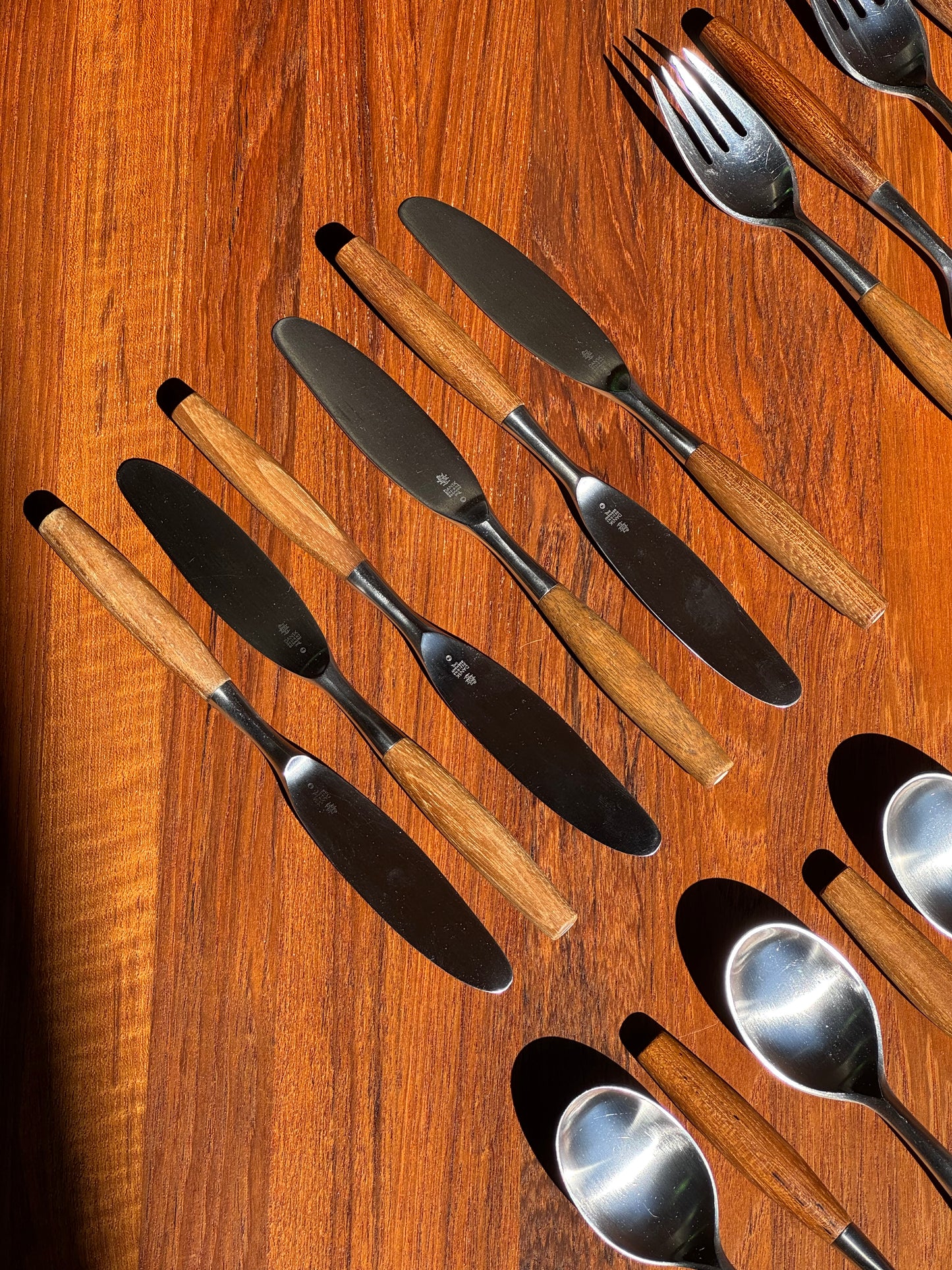 1950s Fjord Flatware by Jens Quistgaard for Dansk in teak and stainless steel