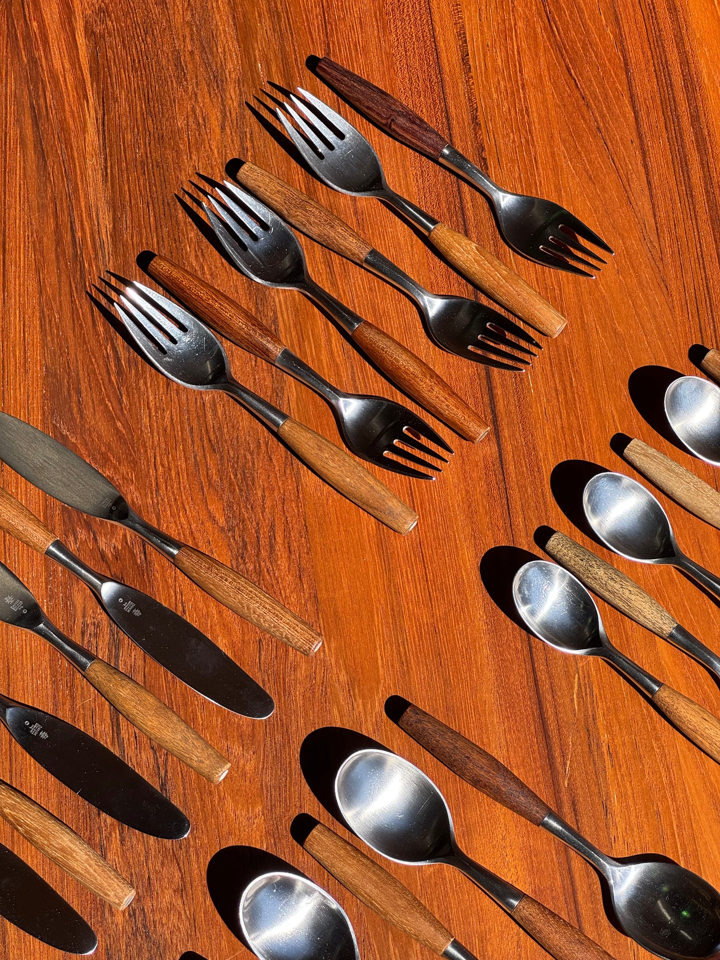 1950s Fjord Flatware by Jens Quistgaard for Dansk in teak and stainless steel