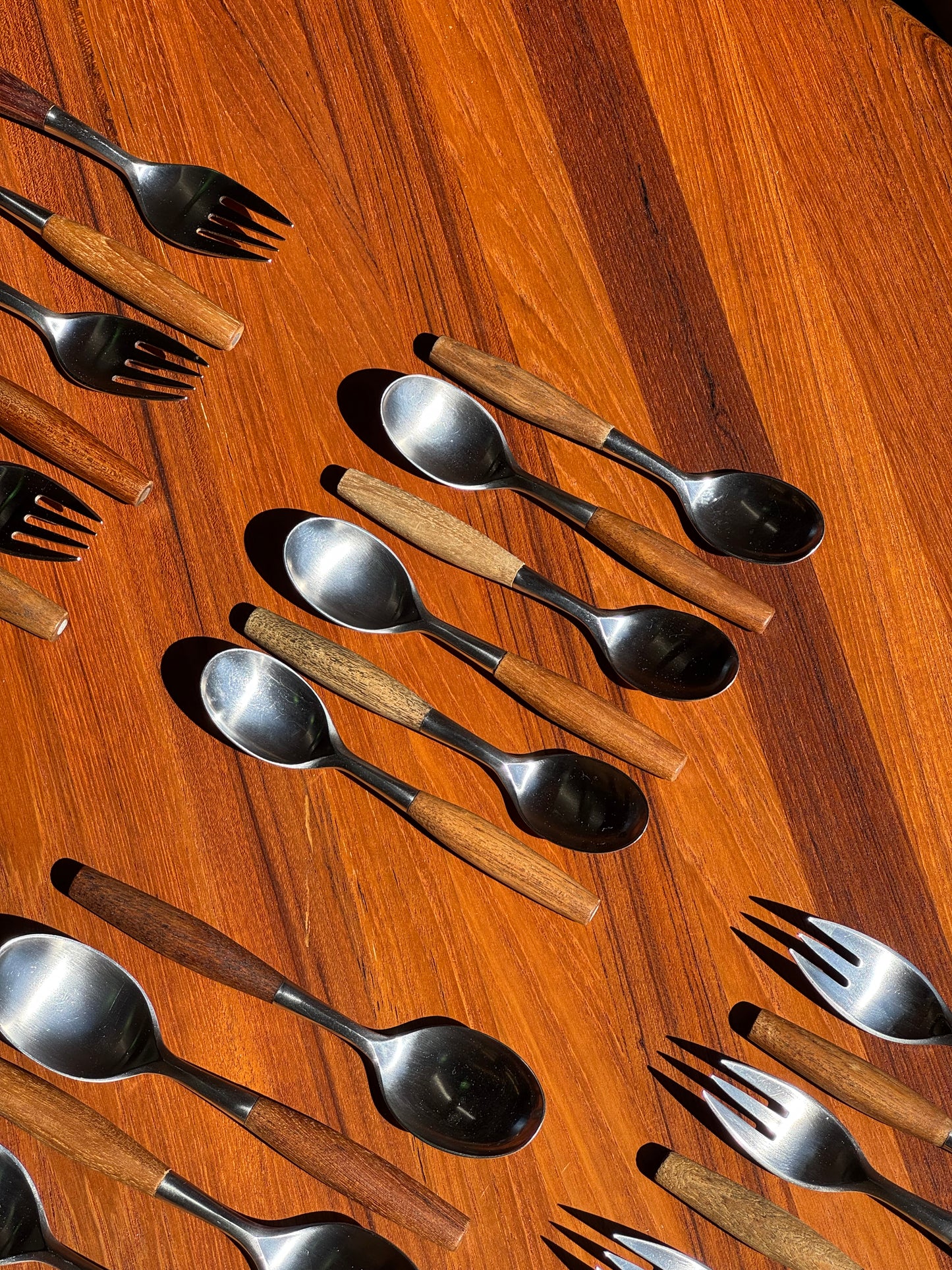 1950s Fjord Flatware by Jens Quistgaard for Dansk in teak and stainless steel