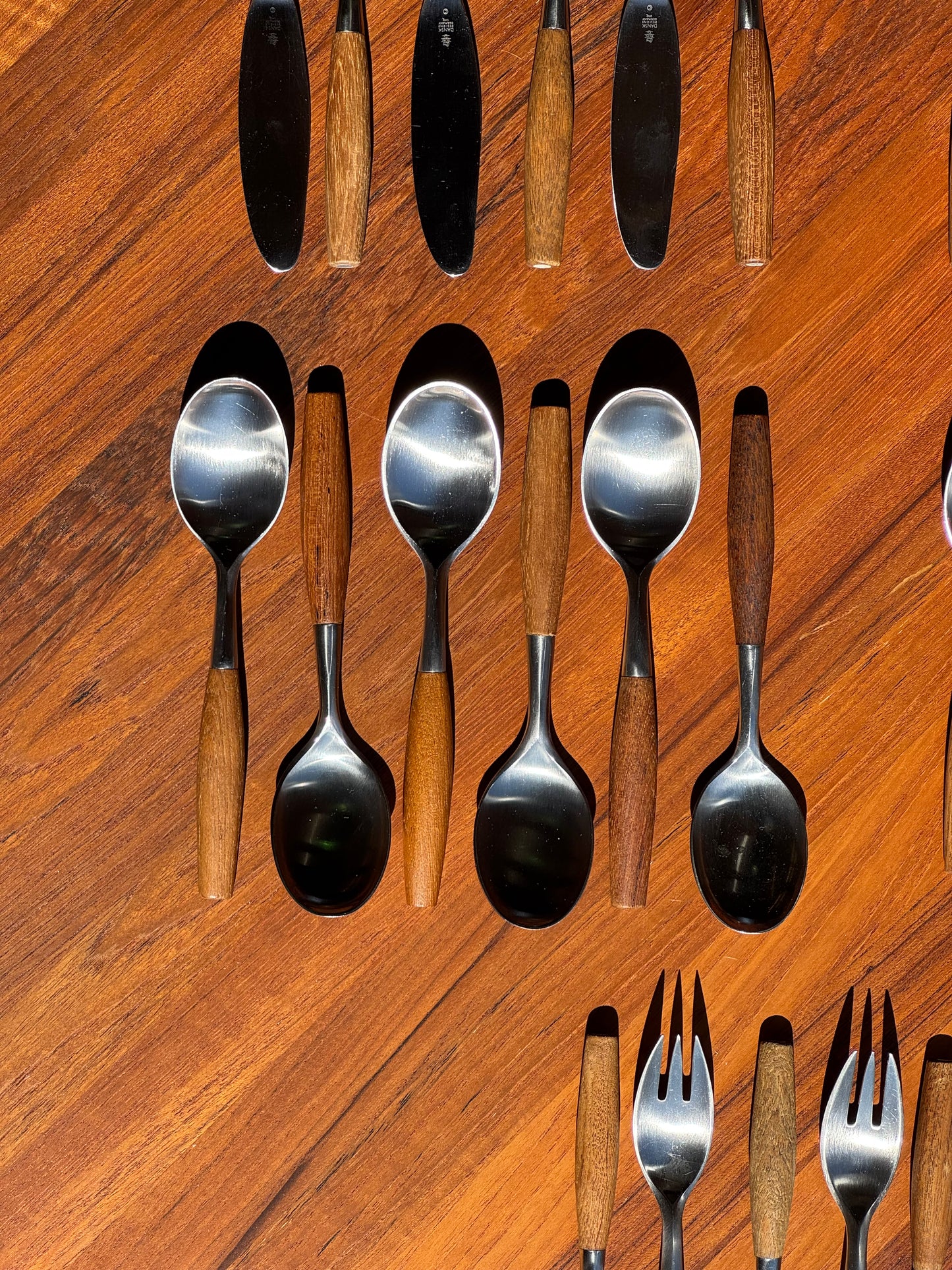 1950s Fjord Flatware by Jens Quistgaard for Dansk in teak and stainless steel