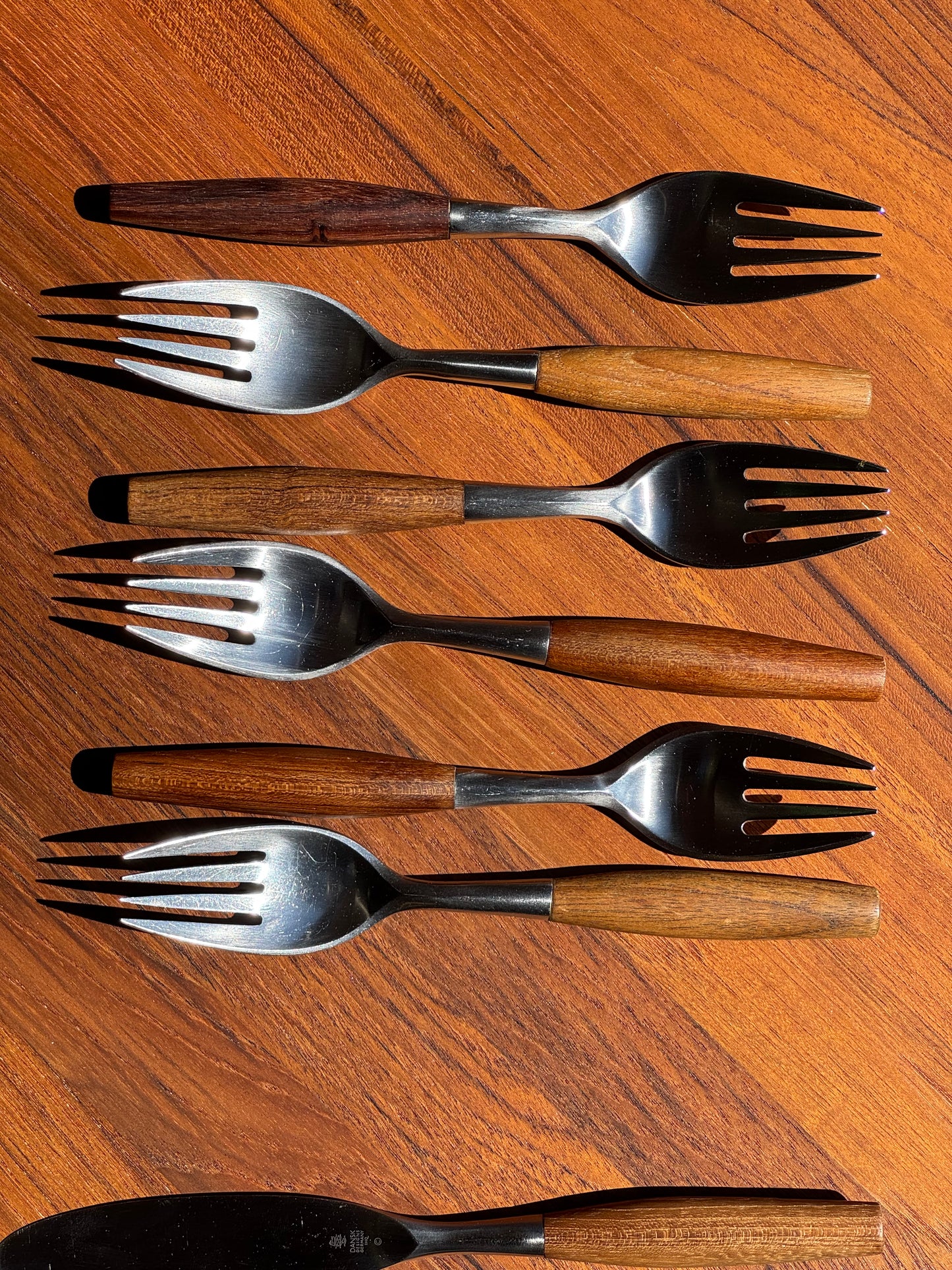1950s Fjord Flatware by Jens Quistgaard for Dansk in teak and stainless steel