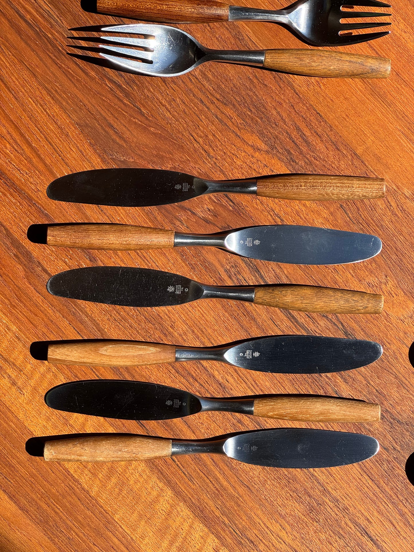1950s Fjord Flatware by Jens Quistgaard for Dansk in teak and stainless steel