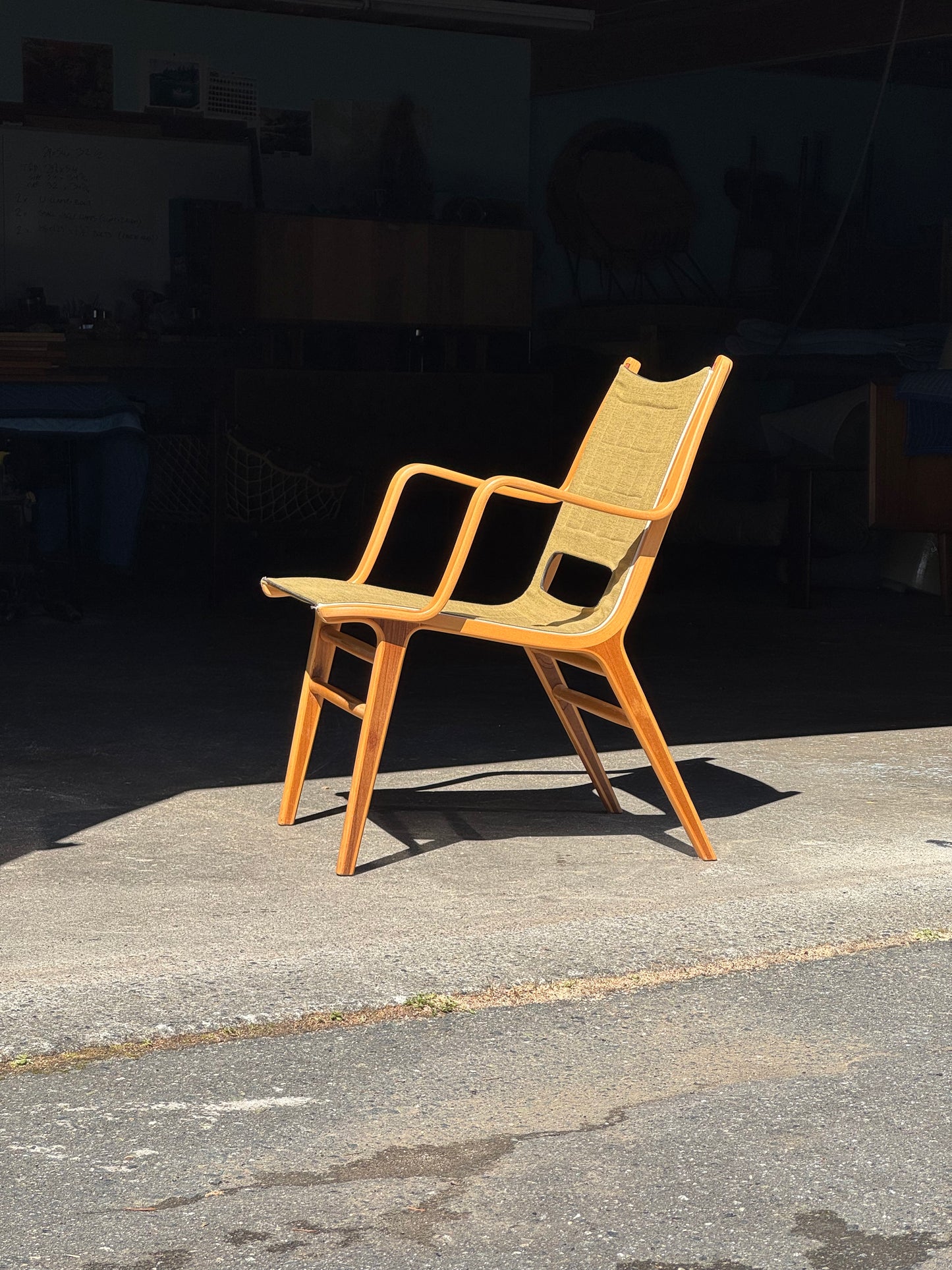 1960s AX Chair by Peter Hvidt and Orla Molgaard Nielsen for Fritz Hansen in beech, mahogany, and green fabric