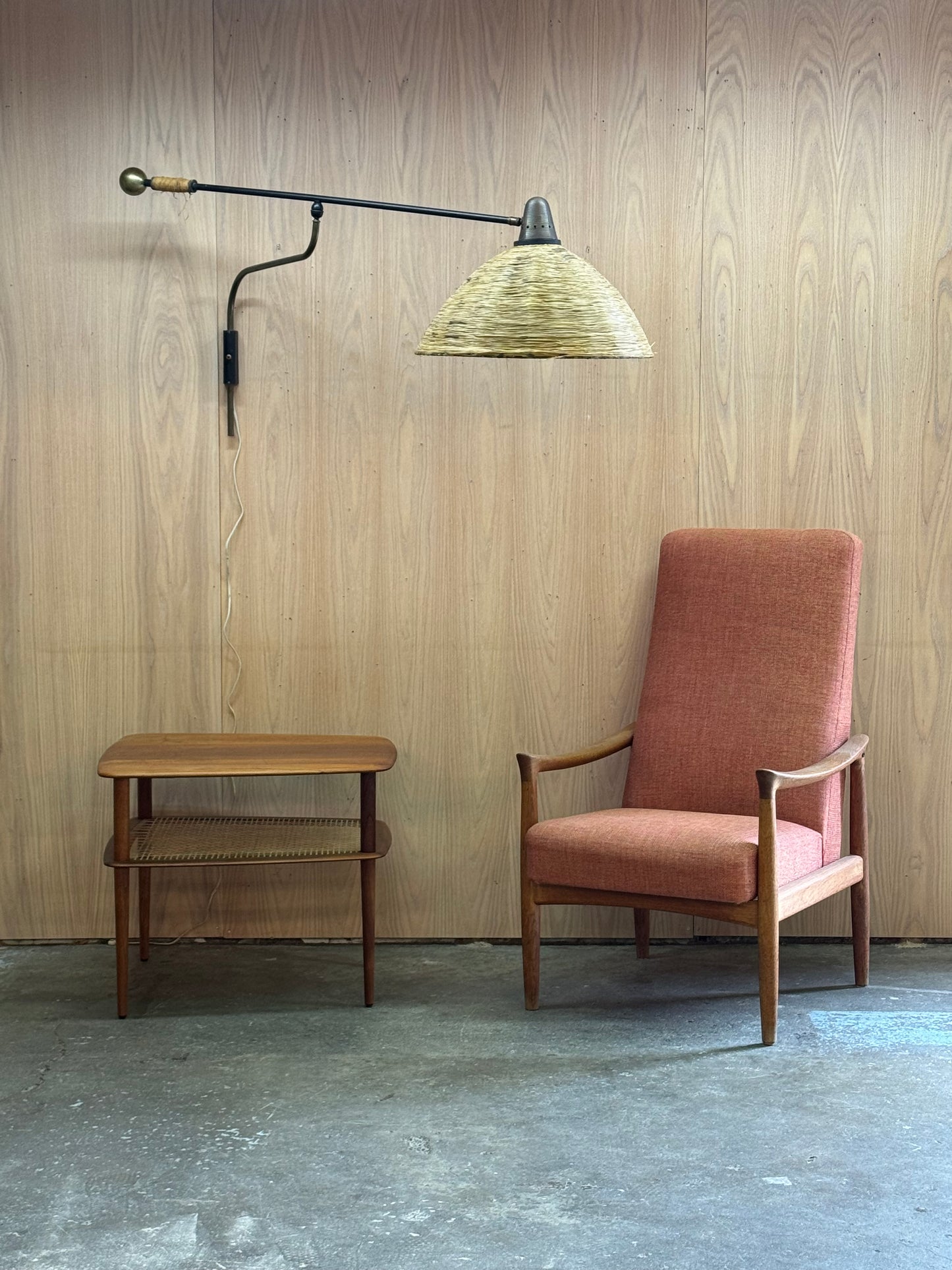 1950s Adjustable French Wall Lamp by Maison Arlus in brass, metal, and rattan