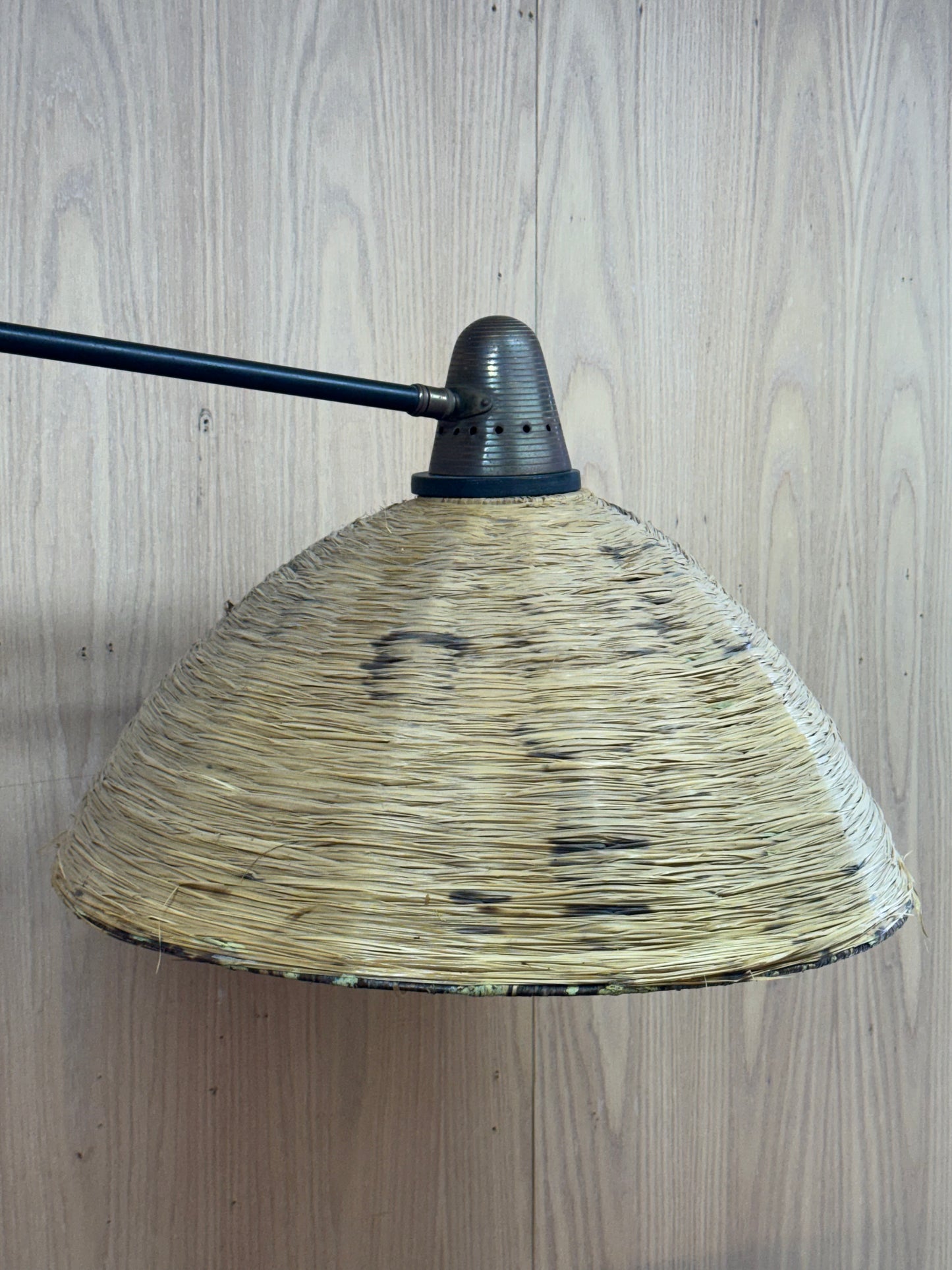 1950s Adjustable French Wall Lamp by Maison Arlus in brass, metal, and rattan