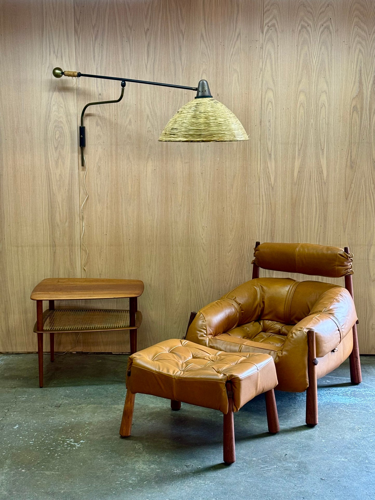 1950s Adjustable French Wall Lamp by Maison Arlus in brass, metal, and rattan