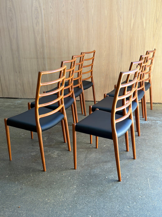 Set of 8 1970s Danish Teak and Leather Dining Chairs by Niels Møller