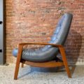 1960s Mid Century “Scoop” Teak and Leather Lounge Chair by R Huber