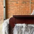 1960’s Brazilian Wood and Icelandic Sheepskin MP185 Chair by Percival Lafer