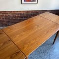 1950s Danish teak and oak draw-leaf dining table by Børge Mogensen